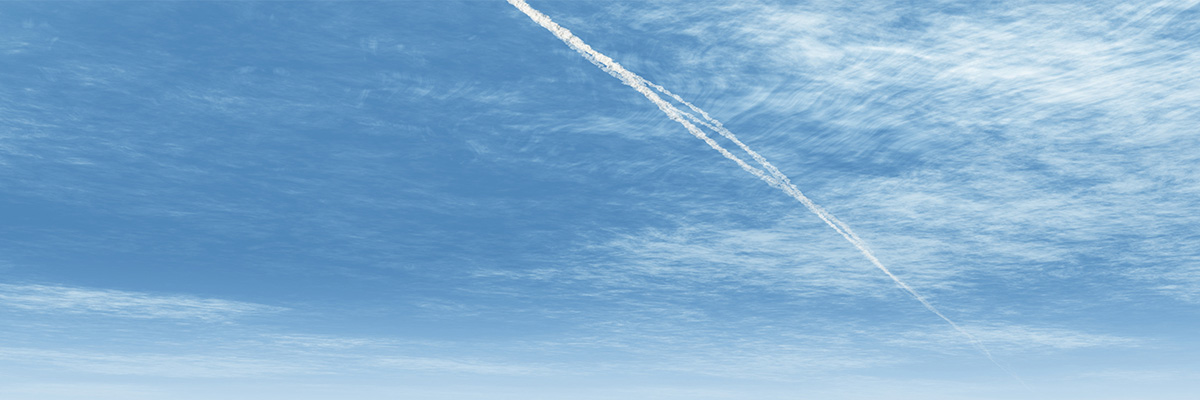 Blue sky with crossing vapour trails, the official Ipilimumab Trace & Catch visual