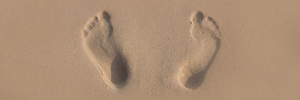 Footprints in sand used on the official Omalizumab product pages